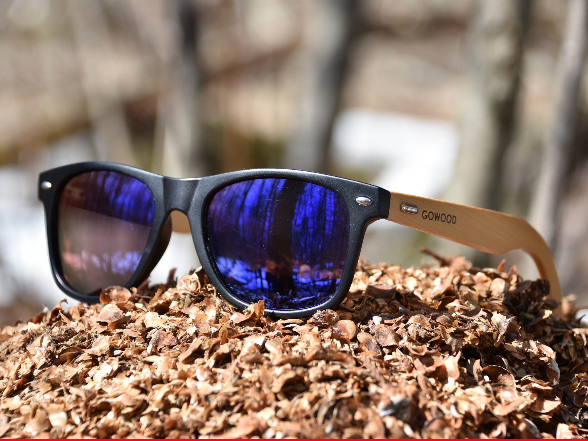 Classic wayfarer sunglasses with blue lenses nature