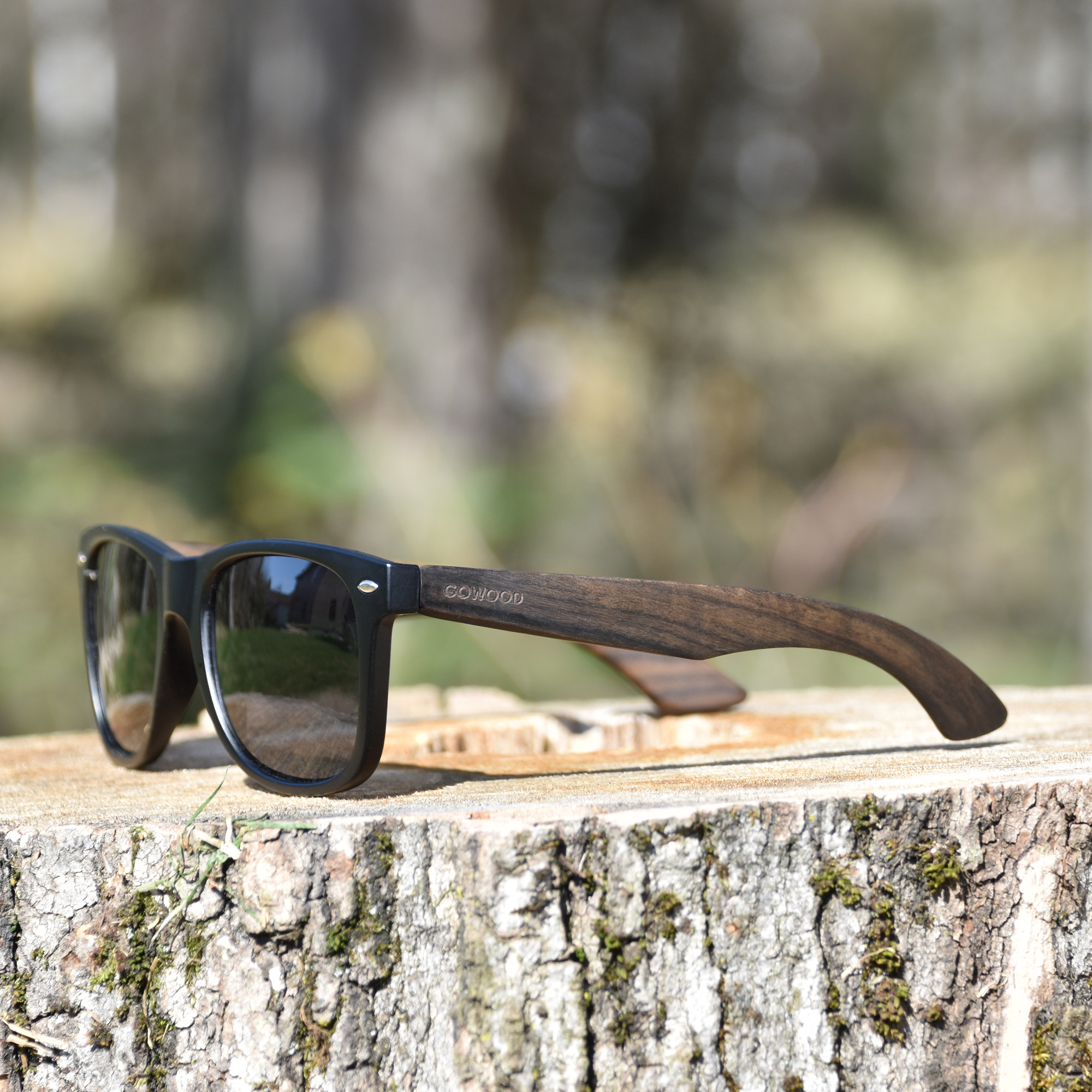 Ebony wood wayfarer sunglasses black lenses outdoors