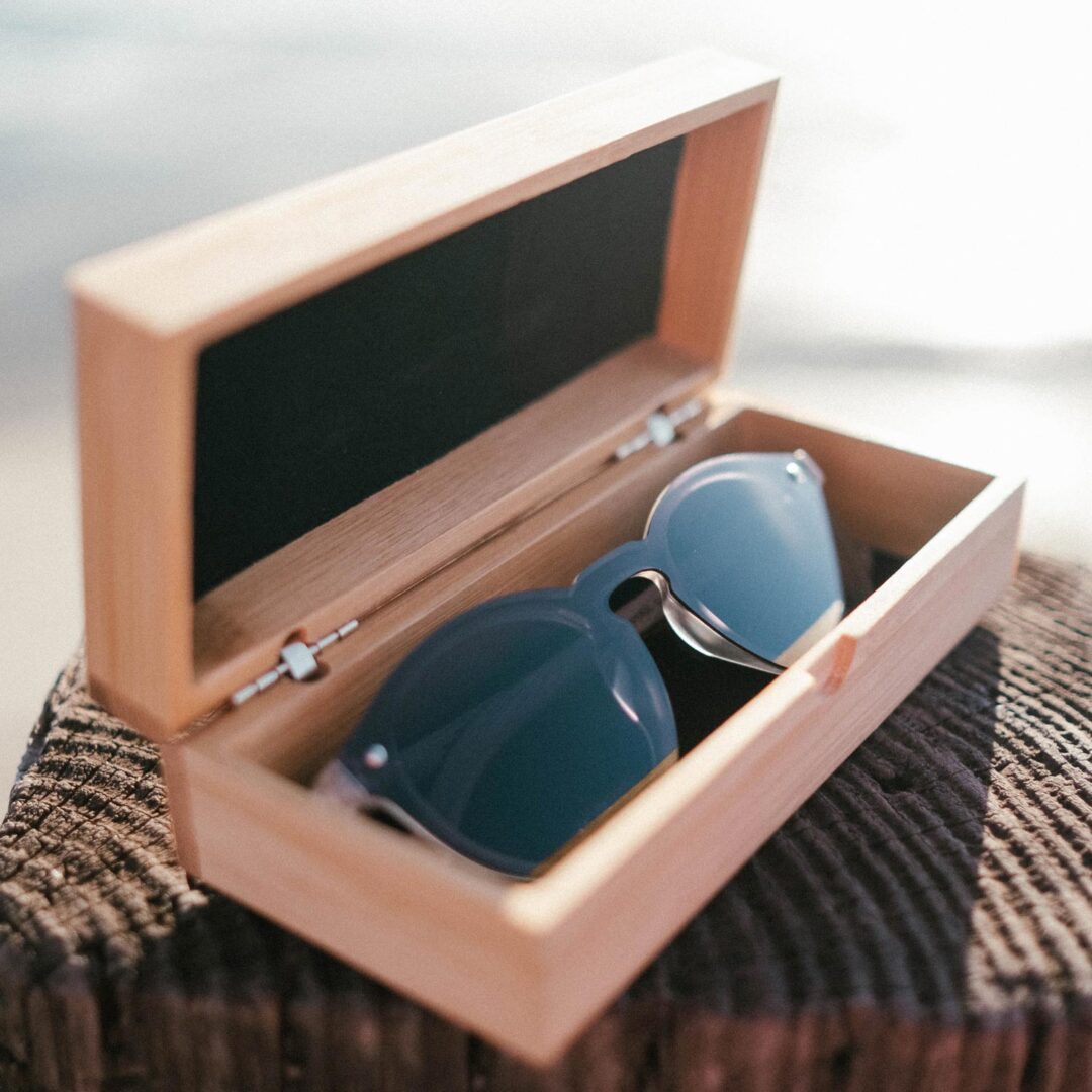 Round walnut wood sunglasses with black polarized one piece lens bamboo box