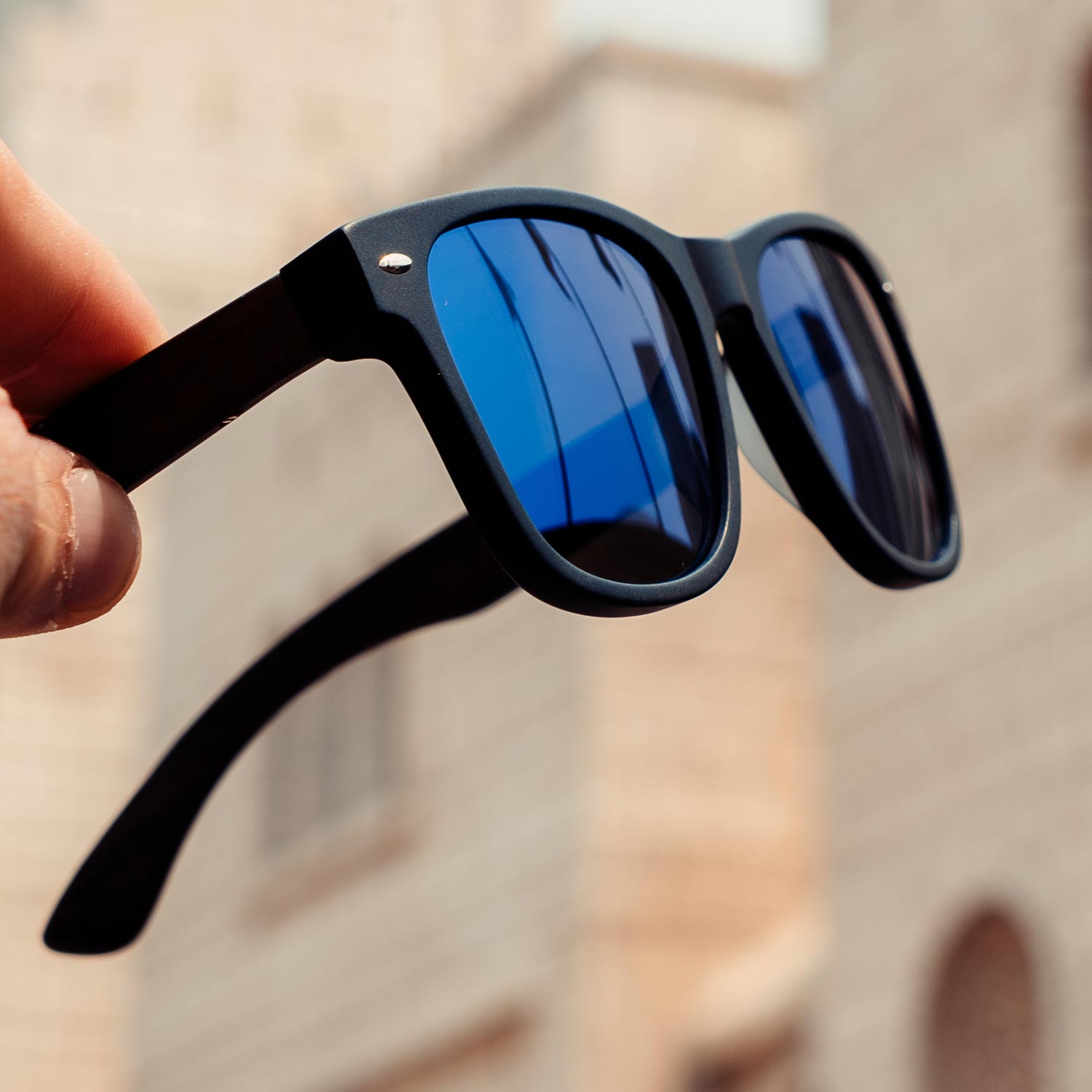 Ebony wood wayfarer sunglasses blue lenses