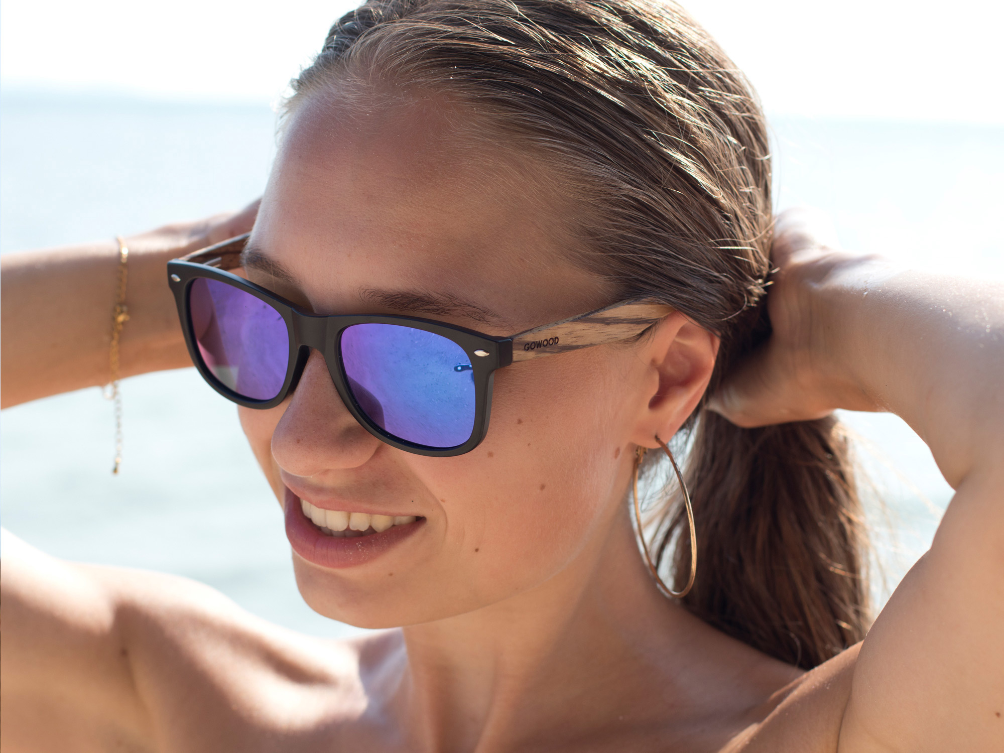 Zebra wood sunglasses with blue mirrored lenses