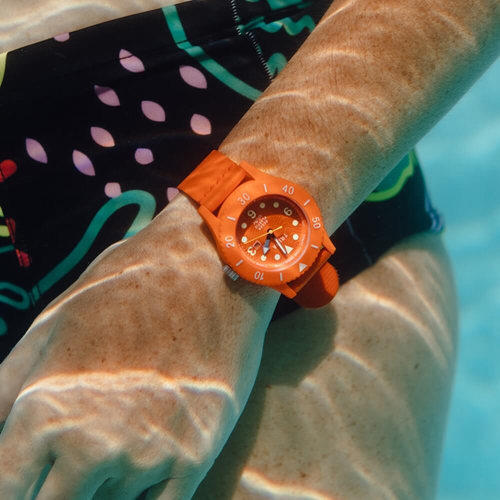 Orange recycled plastic watch made from recycled plastic bottles