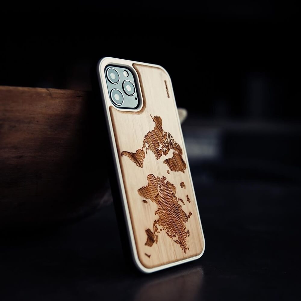Eco-friendly iPhone wooden case featuring a detailed world map